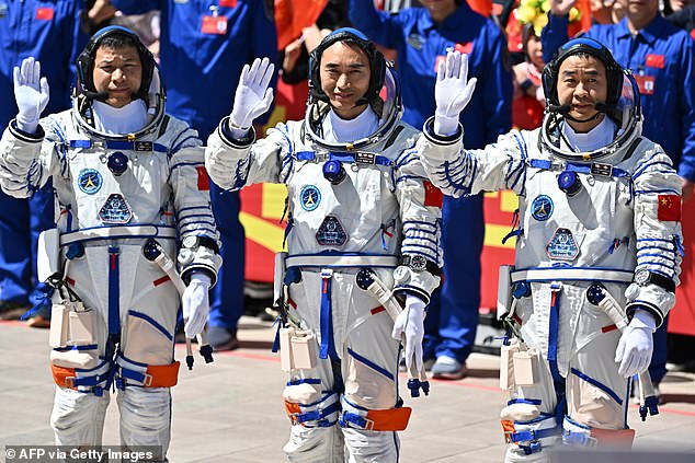 103625627-15266339-Astronauts_Chen_Dong_Chen_Zhongrui_and_Wang_Jie_Pictured_have_be-a-1_1762450993247.jpg