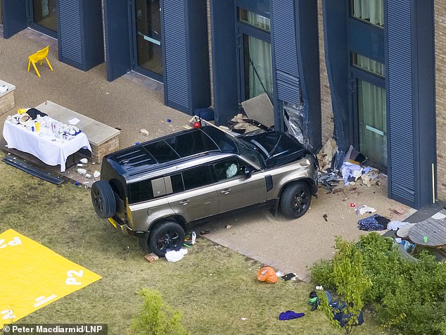 80861197-15261235-An_80_000_Land_Rover_crashed_through_the_primary_school_s_gates_-a-157_1762356639437.jpg